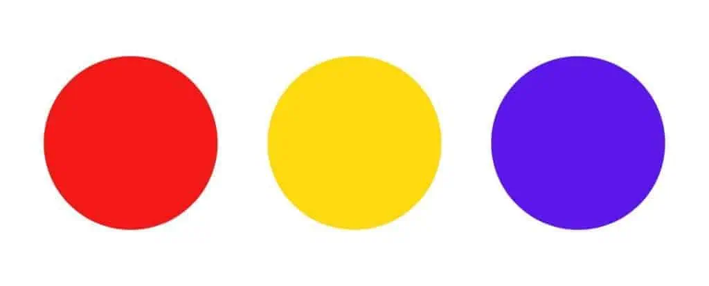 There is an image of a red circle, a yellow circle, and a blue circle. In color theory, these circles represent the primary colors.